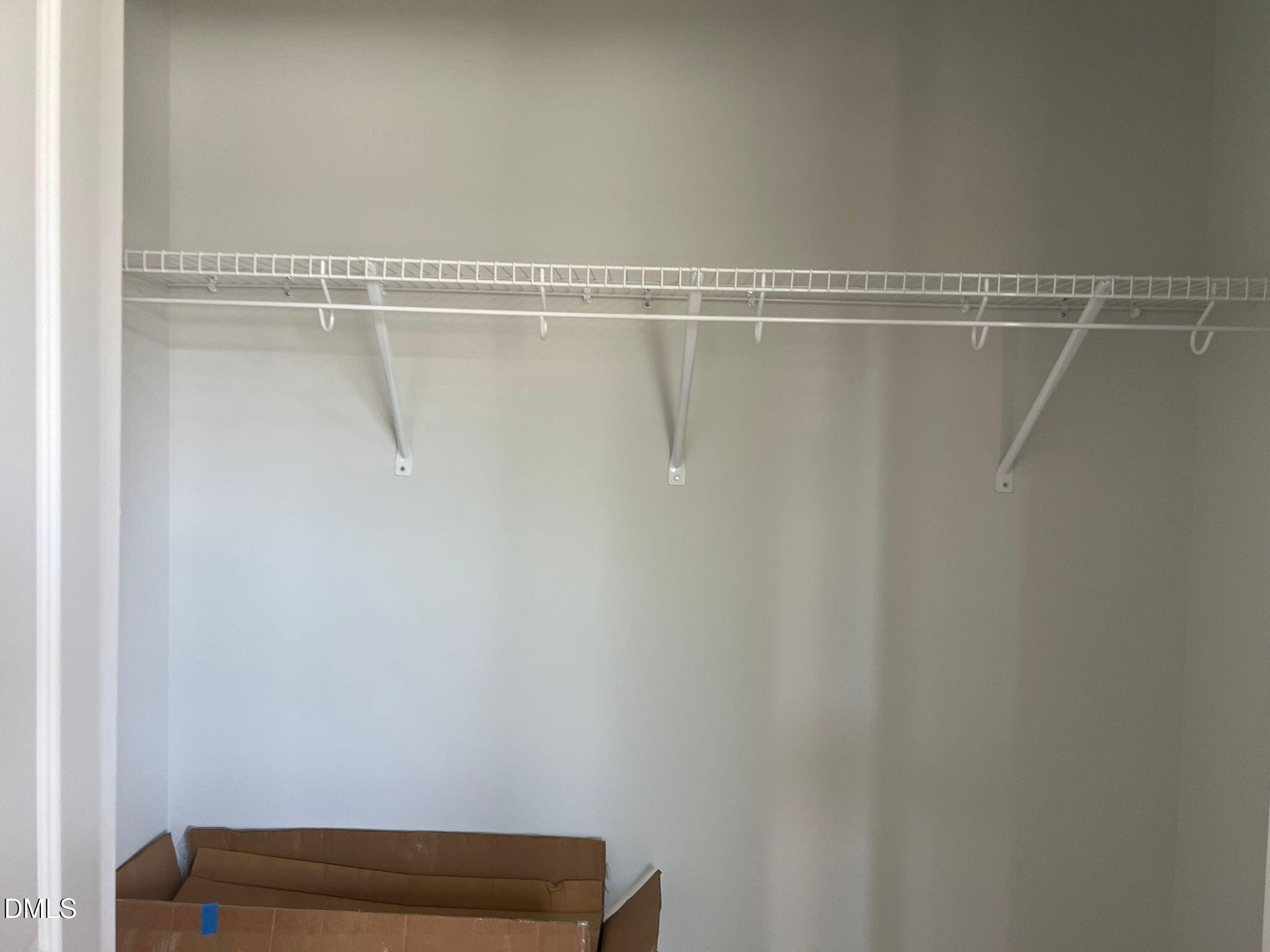 7226 Morris Acres Road Apex, NC 27523 - Photo 37 of 41 a view of small space with racks on the wall