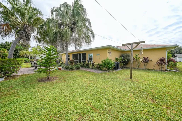 a view of a yard with a patio