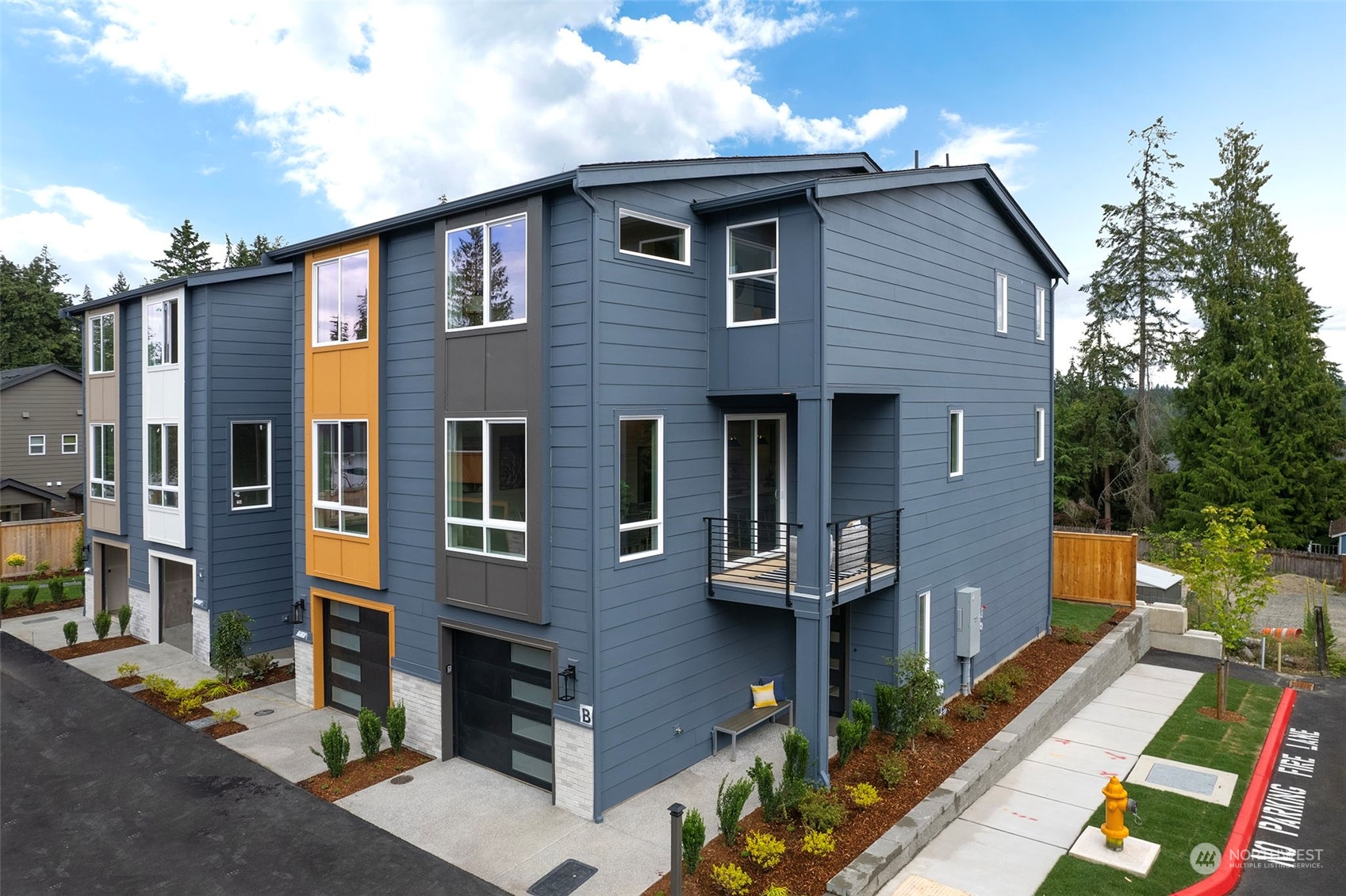 111 161st Place Southeast, Unit B7 Bothell, WA 98012 - Photo 1 of 40 a front view of a house with a yard