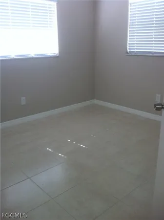 a view of a park with large trees