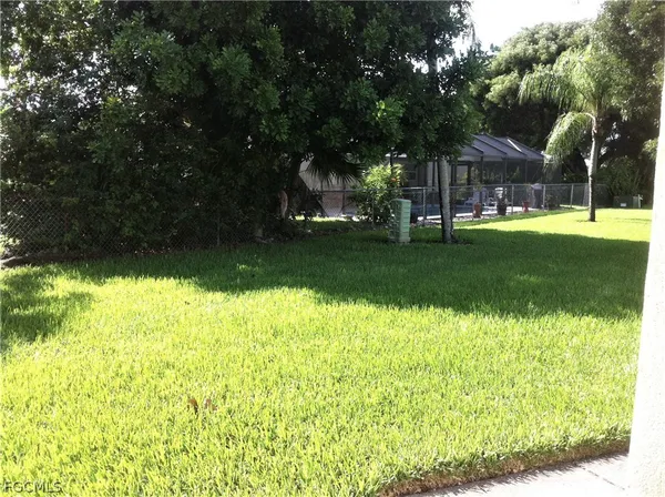 a view of a car parked in front of a house