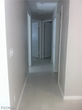 a view of hallway with closet