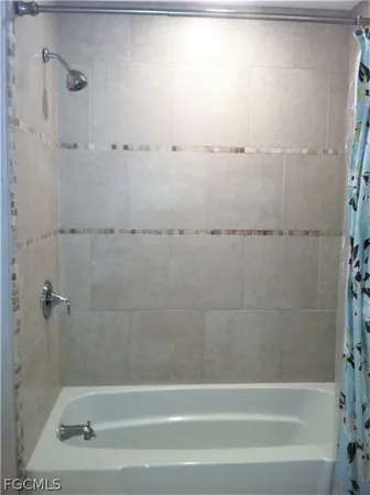 a bathroom with bathtub