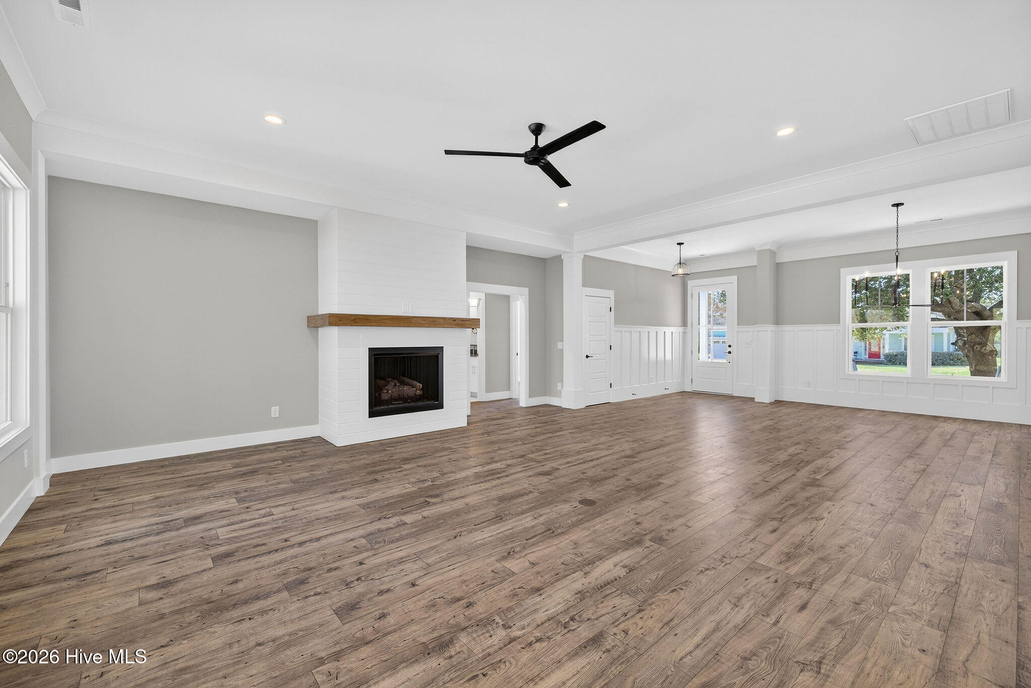 5988 Gray Squirrel Path Southport, NC 28461 - Photo 11 of 52 Living Room with Shiplap accented Gas Fireplace