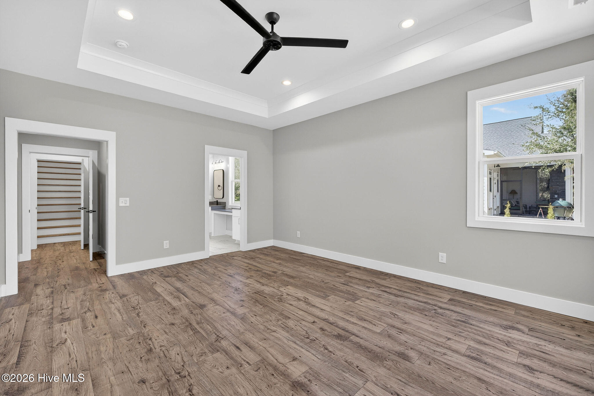 5988 Gray Squirrel Path Southport, NC 28461 - Photo 17 of 52 Spacious Primary Bedroom Suite with trayed ceiling