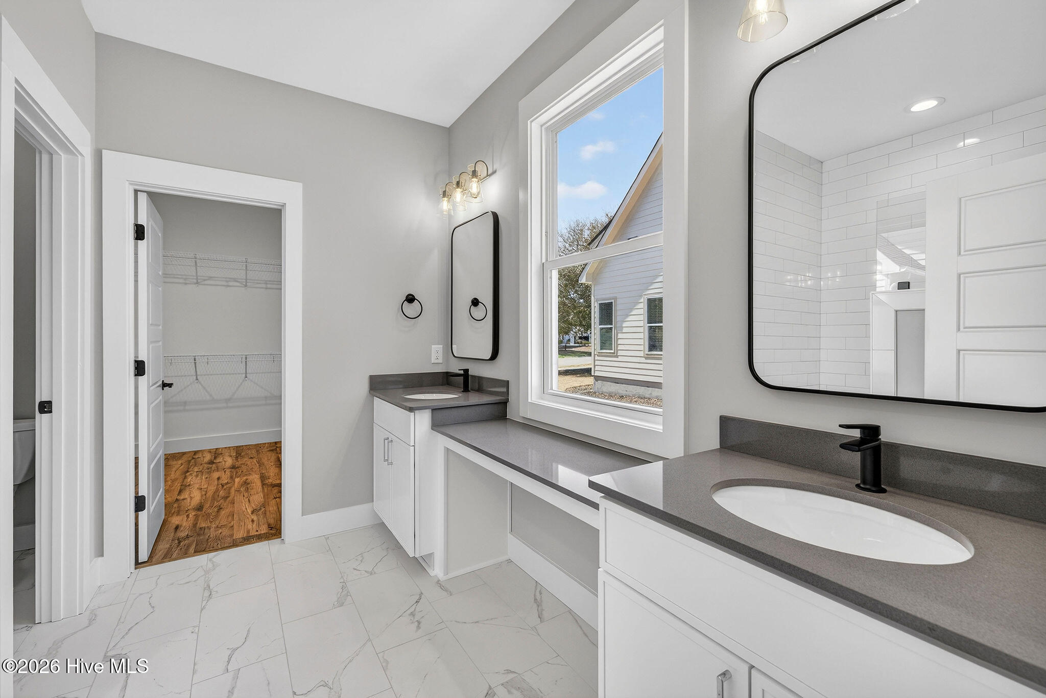 5988 Gray Squirrel Path Southport, NC 28461 - Photo 18 of 52 Primary Bathroom Suite with double vanities