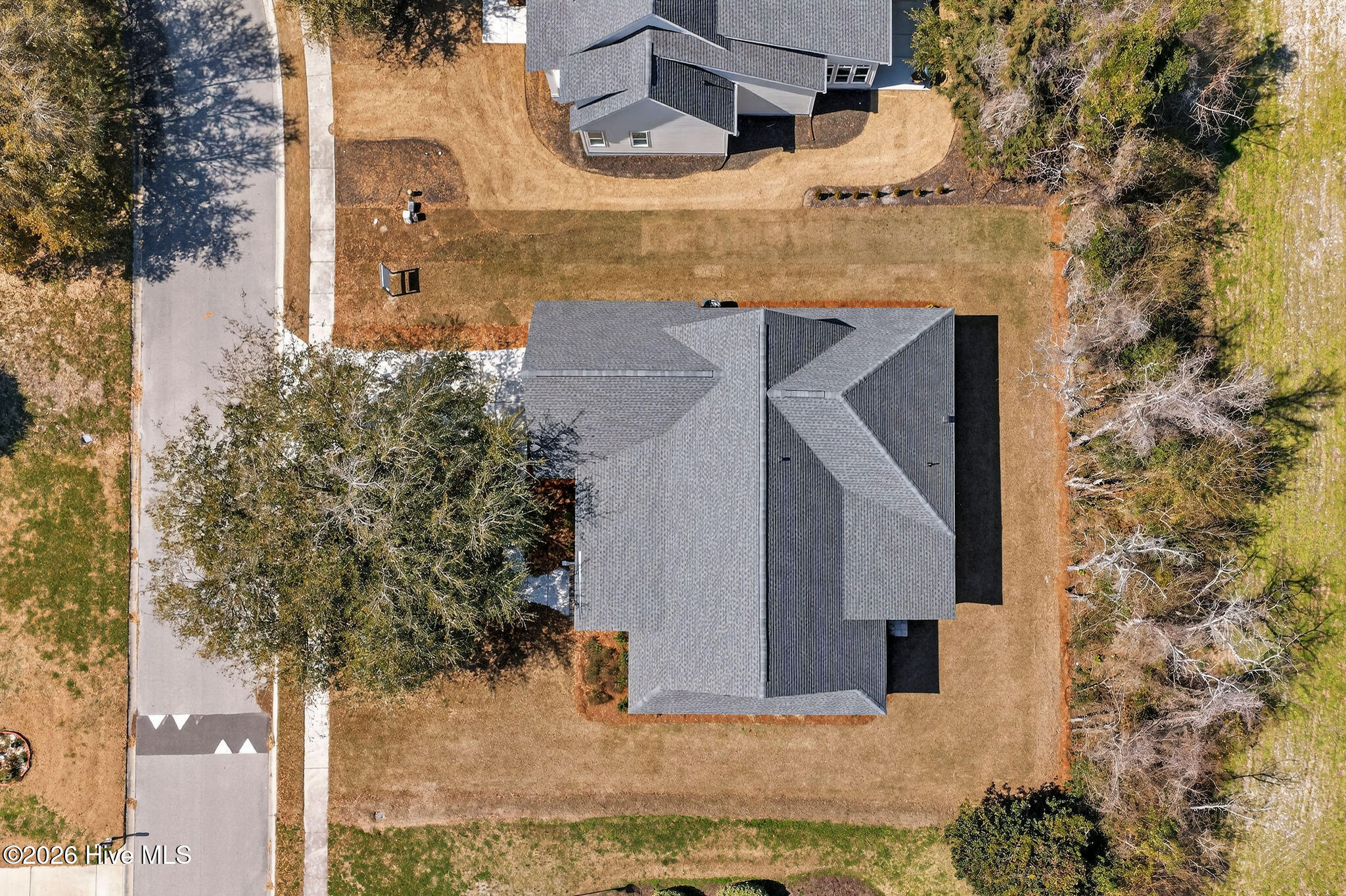 5988 Gray Squirrel Path Southport, NC 28461 - Photo 42 of 52 Overhead drone view of roof line