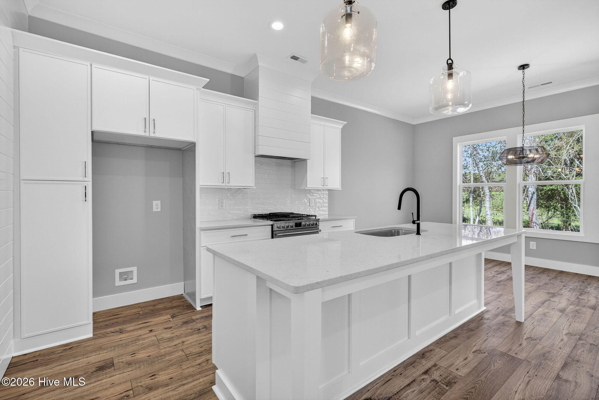 5988 Gray Squirrel Path Southport, NC 28461 - Photo 4 of 52 White Quartz Kitchen Island