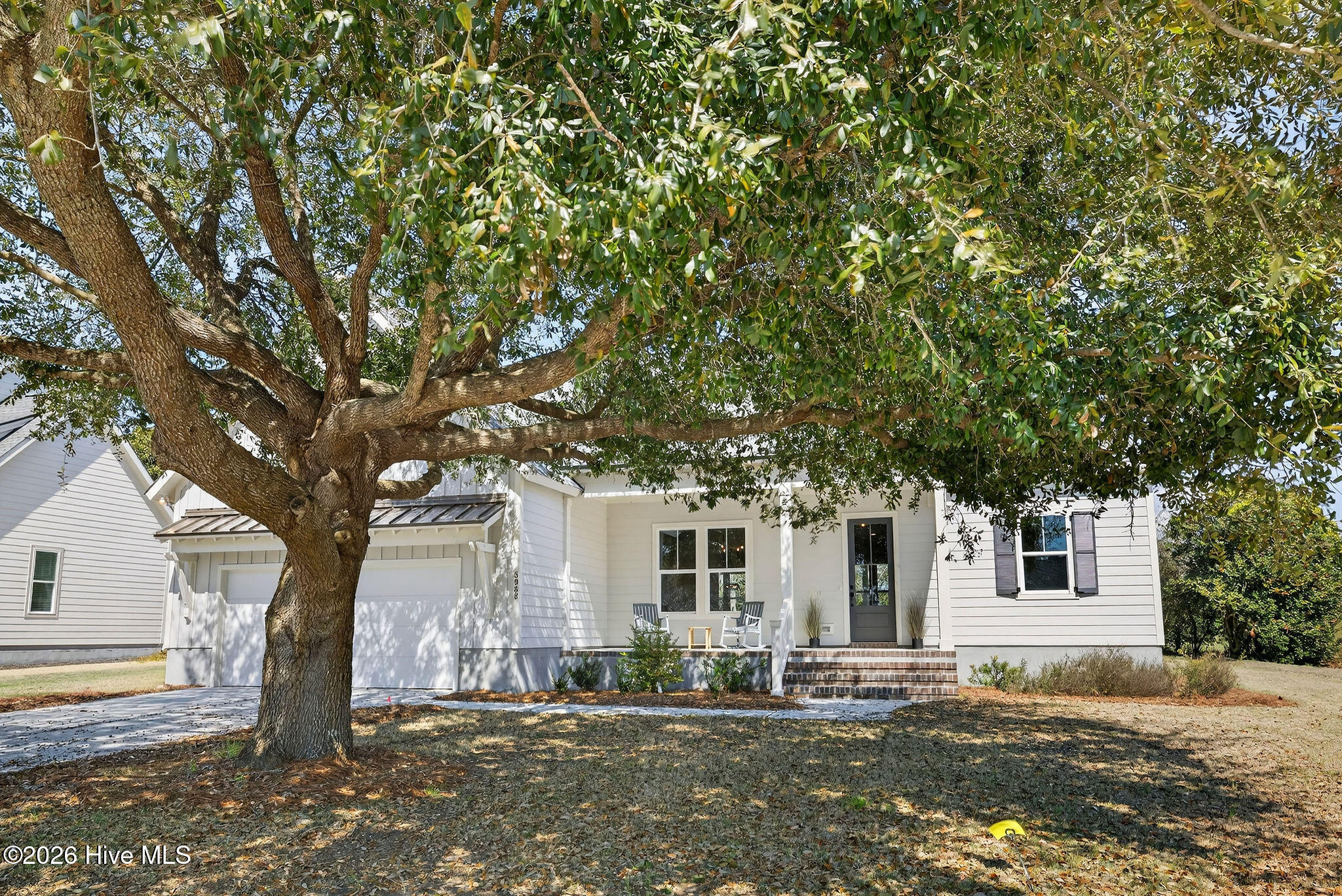 5988 Gray Squirrel Path Southport, NC 28461 - Photo 47 of 52 Front street view with Beautiful Live Oak tree
