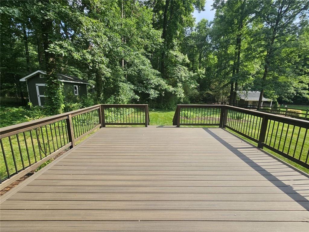 290 Oakmere Road Alpharetta, GA 30009 - Photo 23 of 26 a view of balcony with wooden floor and fence