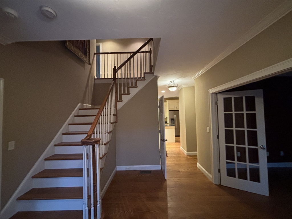 1 Tyler Road Upton, MA 01568 - Photo 12 of 12 a view of entryway and hall with wooden floor