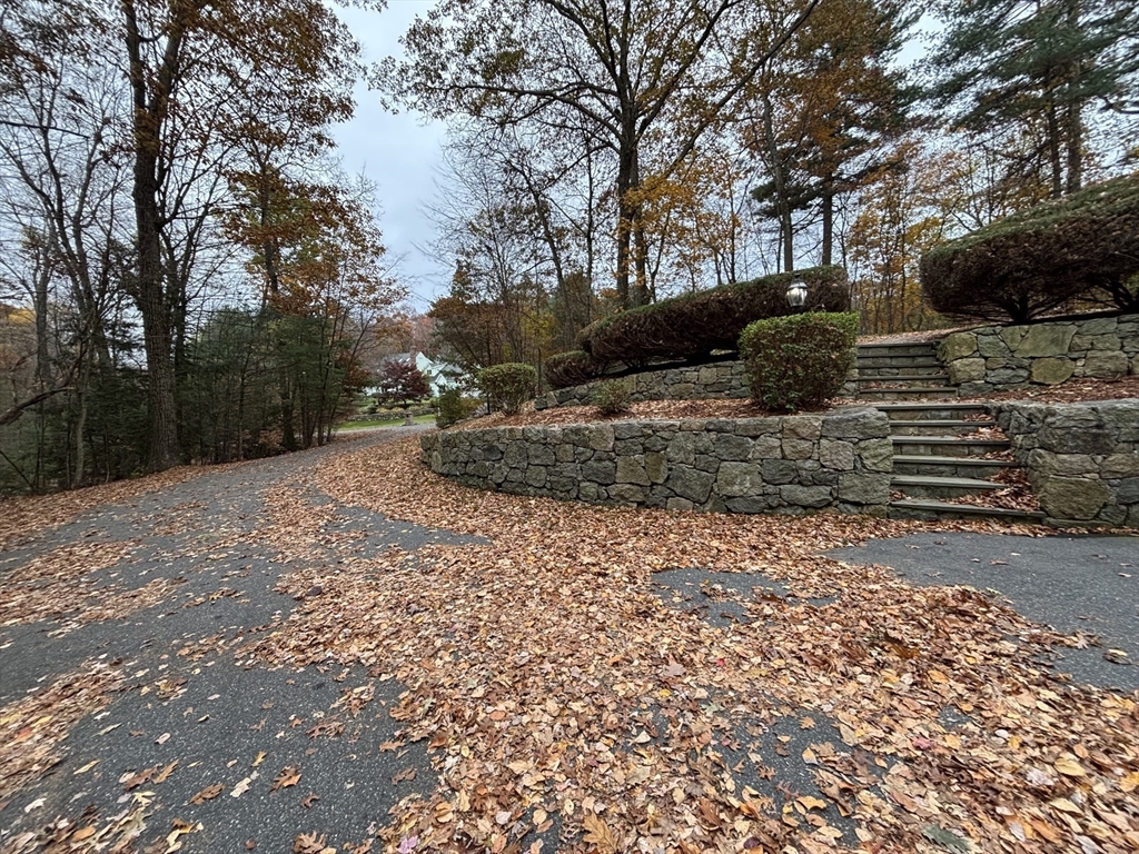 1 Tyler Road Upton, MA 01568 - Photo 2 of 12 a view of a backyard with large trees