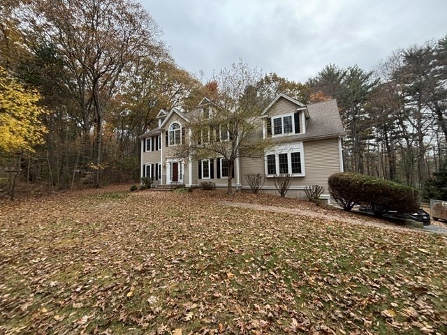 1 Tyler Road Upton, MA 01568 - Photo 3 of 12 a front view of a house with a yard