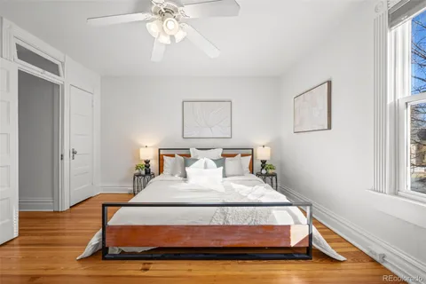 a bathroom with a sink a mirror and a shower