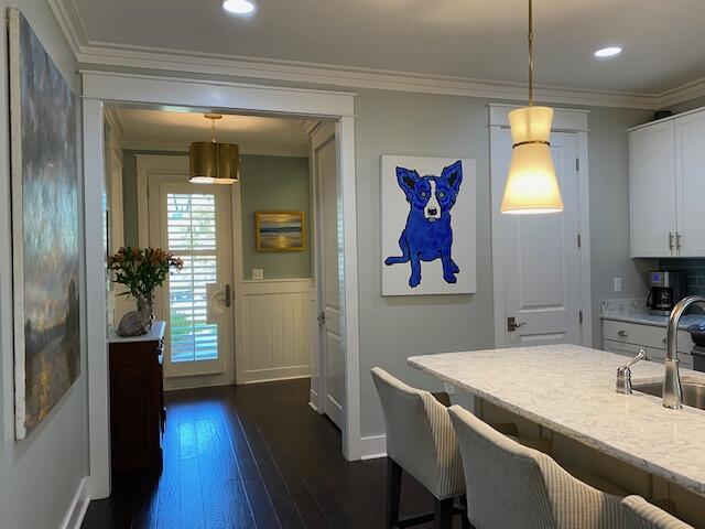 290 Jack Knife Drive Watersound, FL 32461 - Photo 13 of 40 a hallway with a dining table and chairs