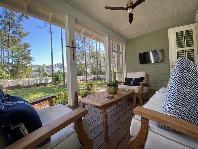 290 Jack Knife Drive Watersound, FL 32461 - Photo 18 of 40 a view of a dining room with furniture window and outside view