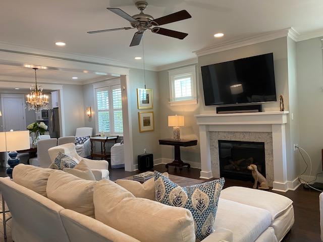 290 Jack Knife Drive Watersound, FL 32461 - Photo 3 of 40 a living room with furniture a fireplace and a flat screen tv