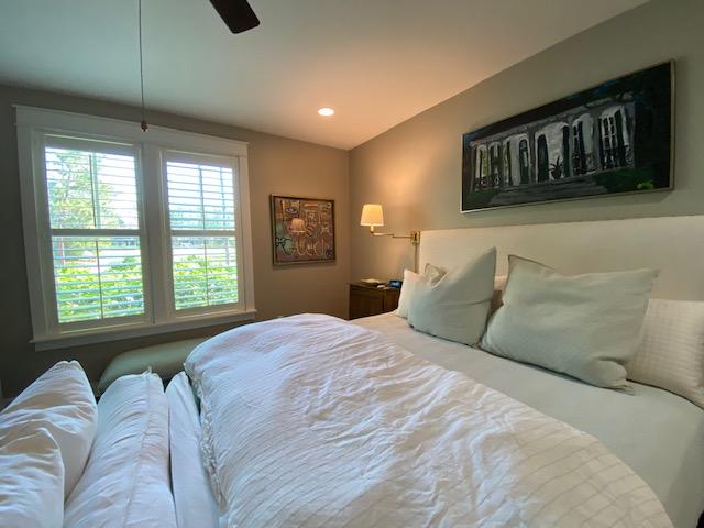 290 Jack Knife Drive Watersound, FL 32461 - Photo 23 of 40 a bedroom with a large bed and a window