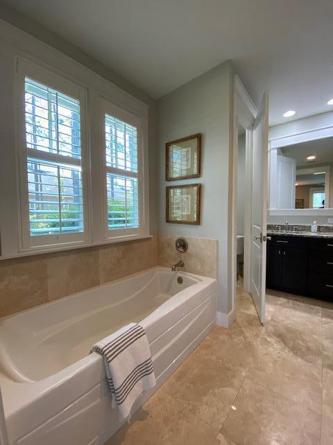 290 Jack Knife Drive Watersound, FL 32461 - Photo 24 of 40 a spacious bathroom with a tub sink and mirror