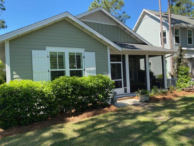 290 Jack Knife Drive Watersound, FL 32461 - Photo 29 of 40 front view of a house with a yard