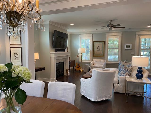 290 Jack Knife Drive Watersound, FL 32461 - Photo 4 of 40 a living room with furniture a fireplace and a flat screen tv
