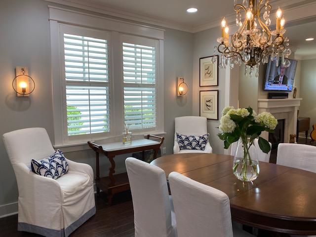 290 Jack Knife Drive Watersound, FL 32461 - Photo 7 of 40 a dining room with furniture a chandelier and window