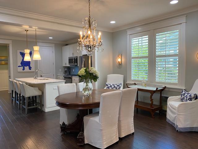 290 Jack Knife Drive Watersound, FL 32461 - Photo 9 of 40 a view of a dining room with furniture window and wooden floor