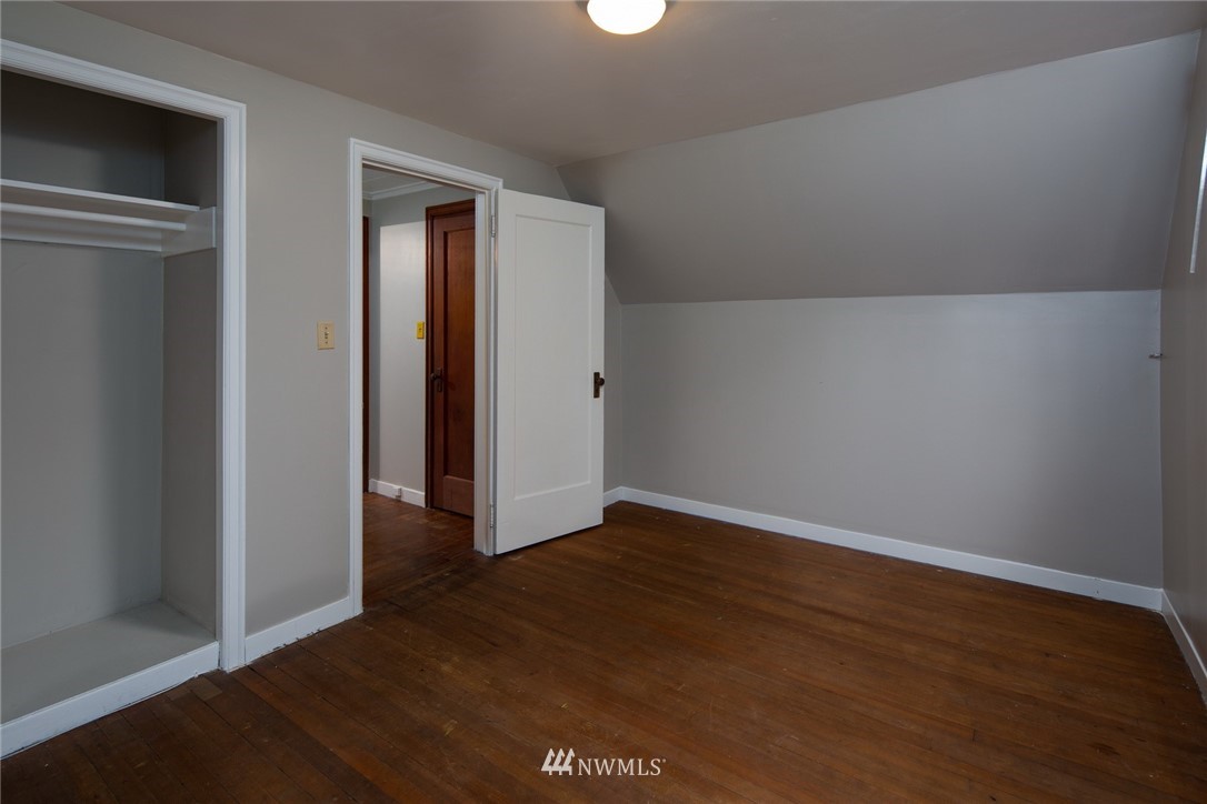 209 Parkridge Road Bellingham, WA 98225 - Photo 14 of 33 a view of an empty room with wooden floor