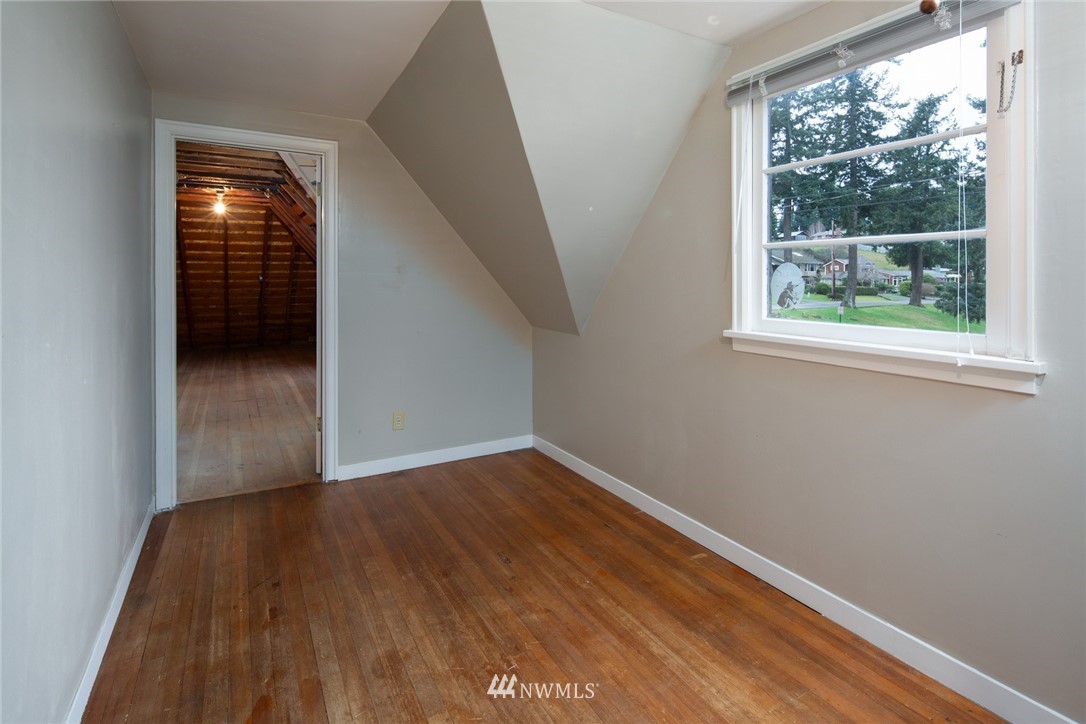 209 Parkridge Road Bellingham, WA 98225 - Photo 16 of 33 an empty room with wooden floor and windows
