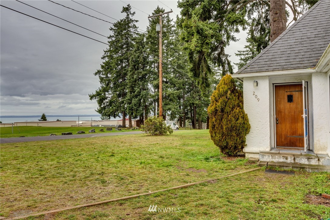 209 Parkridge Road Bellingham, WA 98225 - Photo 29 of 33 a view of a swimming pool with an outdoor space and seating area