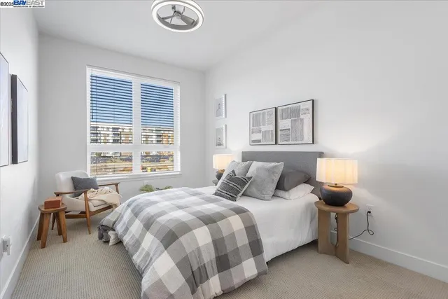 a bathroom with a toilet a sink and a mirror