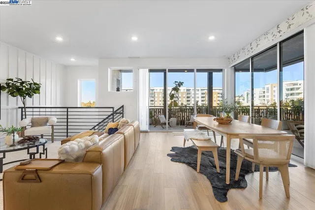 a view of a living room and dining room