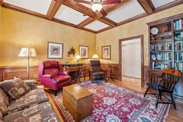 a spacious bedroom with a balcony a bed and a fireplace