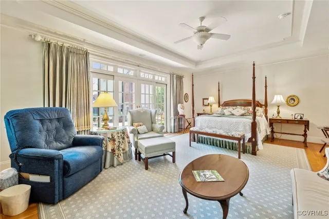 a view of a storage area with furniture and wooden floor