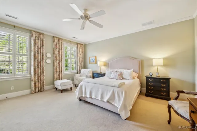 a room with furniture and a view of bedroom