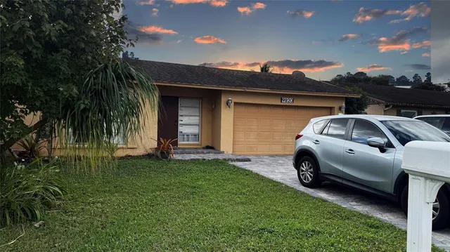 a car parked in front of a house