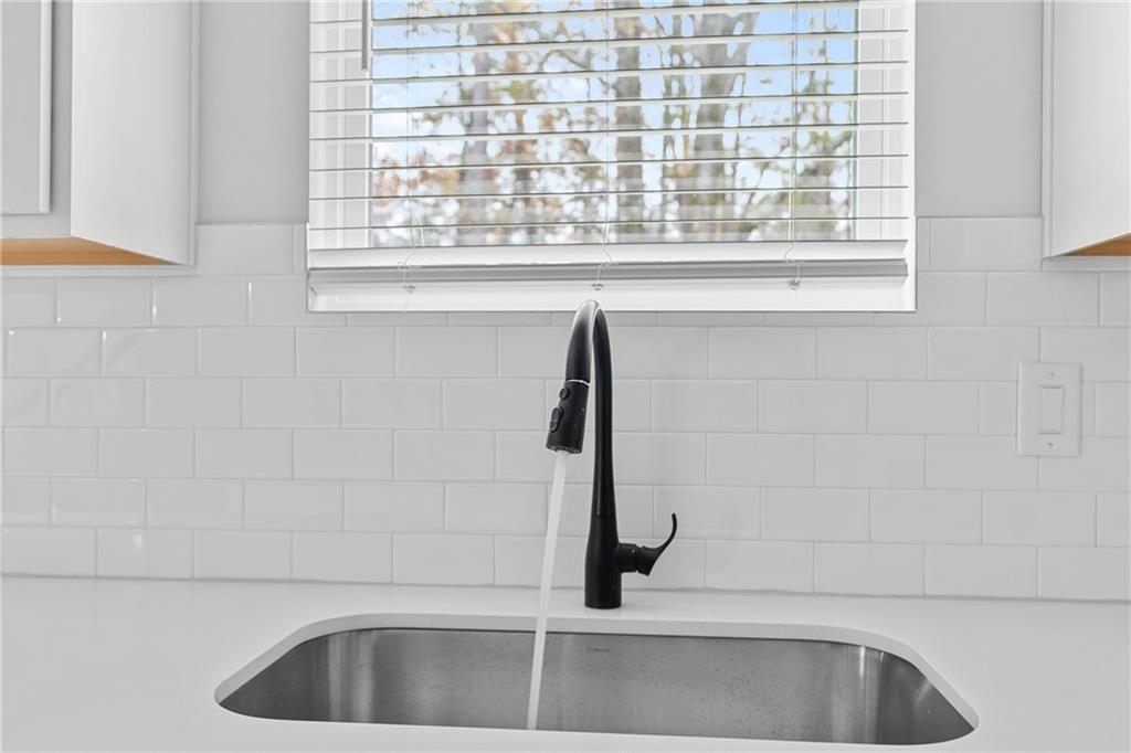 3699 Annsbury Court Lilburn, GA 30047 - Photo 20 of 45 a bathroom with a window