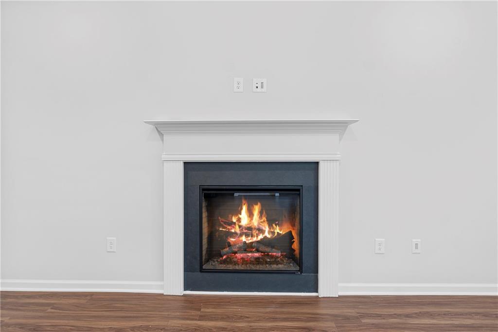 3699 Annsbury Court Lilburn, GA 30047 - Photo 24 of 45 a living room with a fireplace