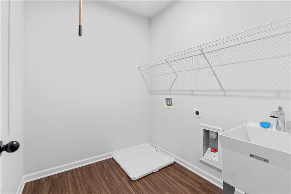 3699 Annsbury Court Lilburn, GA 30047 - Photo 32 of 45 a storage room with wooden floor