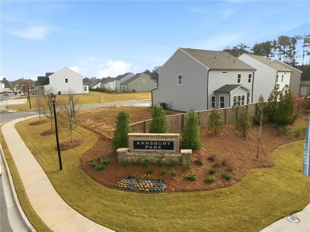 3699 Annsbury Court Lilburn, GA 30047 - Photo 44 of 45 a view of a house with a yard