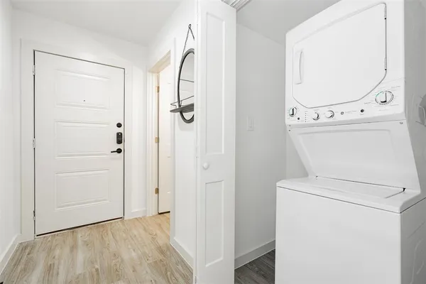 a view of a storage & utility room with washer and dryer