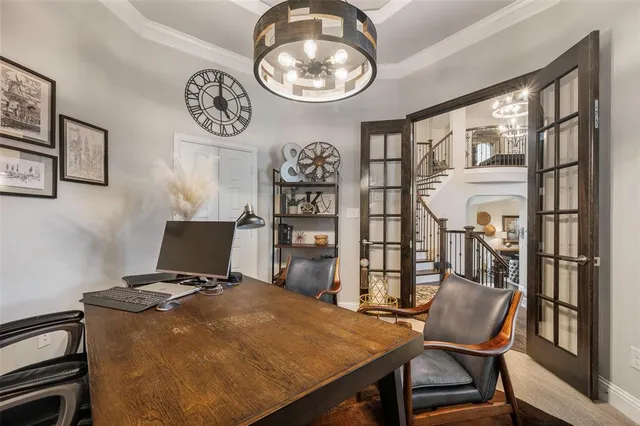 a view of a workspace with furniture