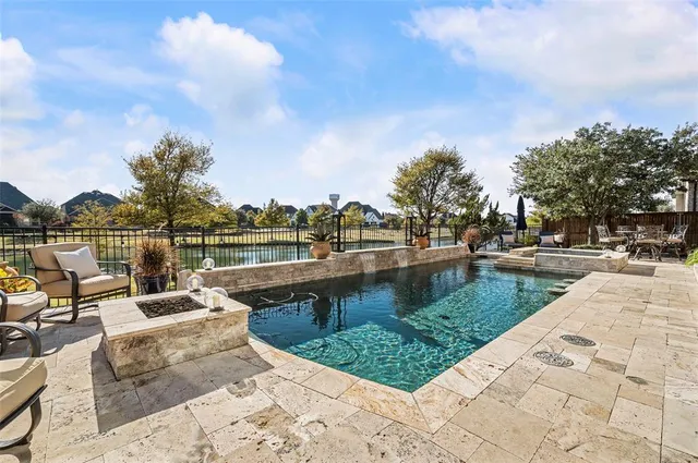 a view of a lake with a garden