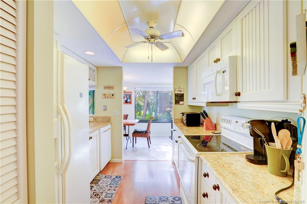 233 Northeast Edgewater Drive, Unit 204 Stuart, FL 34996 - Photo 14 of 56 a very nice looking kitchen with a large window