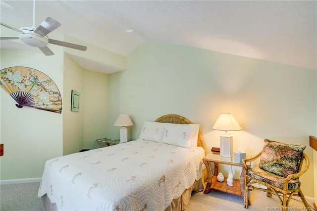 a bathroom with a sink a mirror and a shower