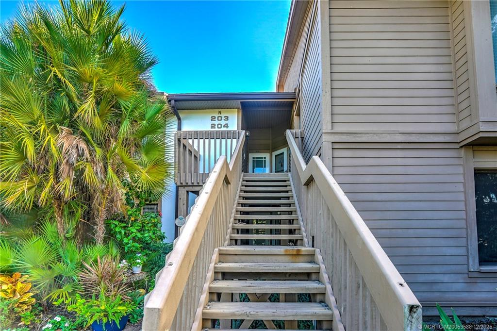 233 Northeast Edgewater Drive, Unit 204 Stuart, FL 34996 - Photo 8 of 56 a view of entryway with a front door