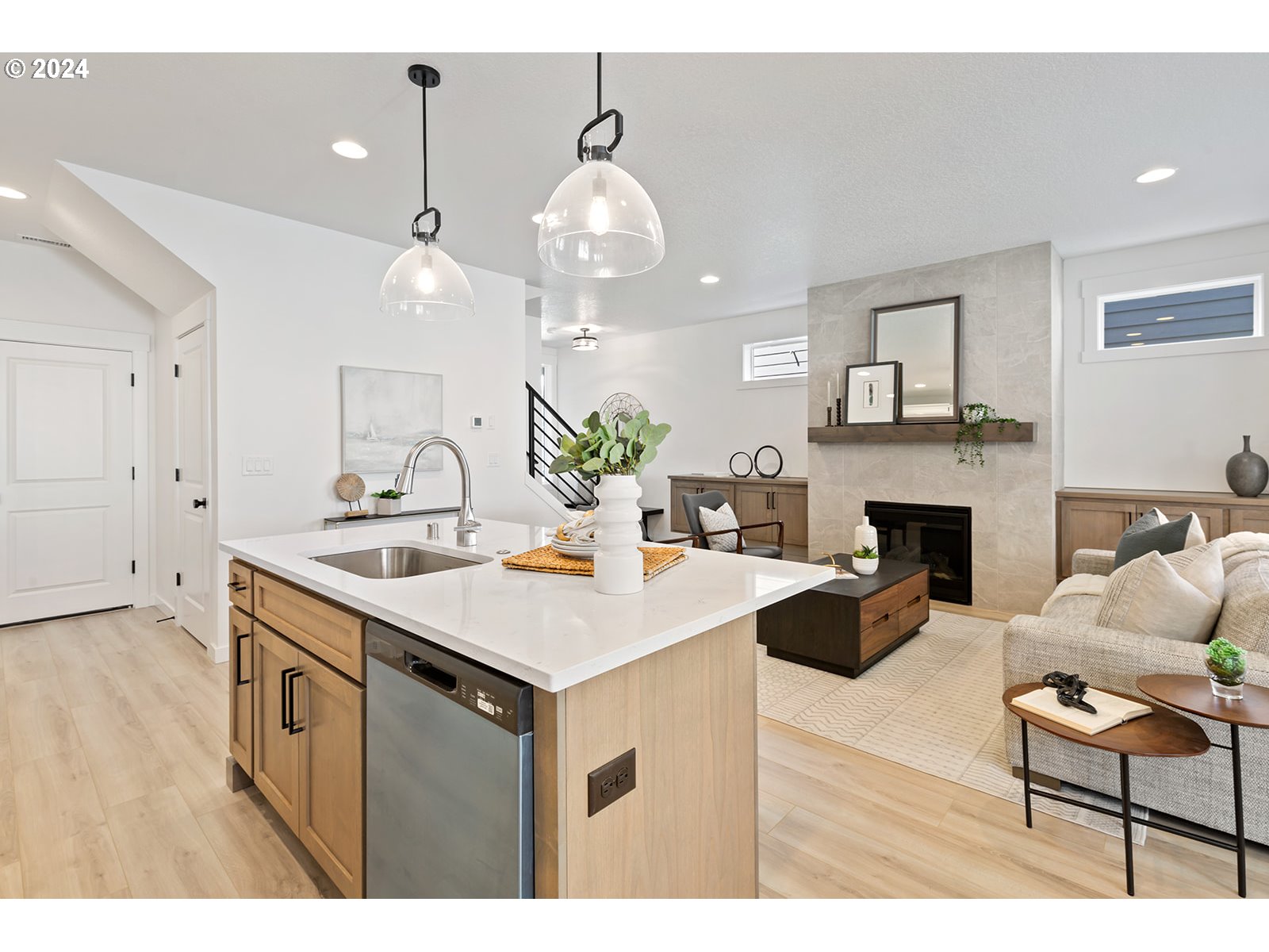 820 Northwest 178th Street Ridgefield, WA 98642 - Photo 23 of 45 a view of a kitchen area with furniture and fireplace