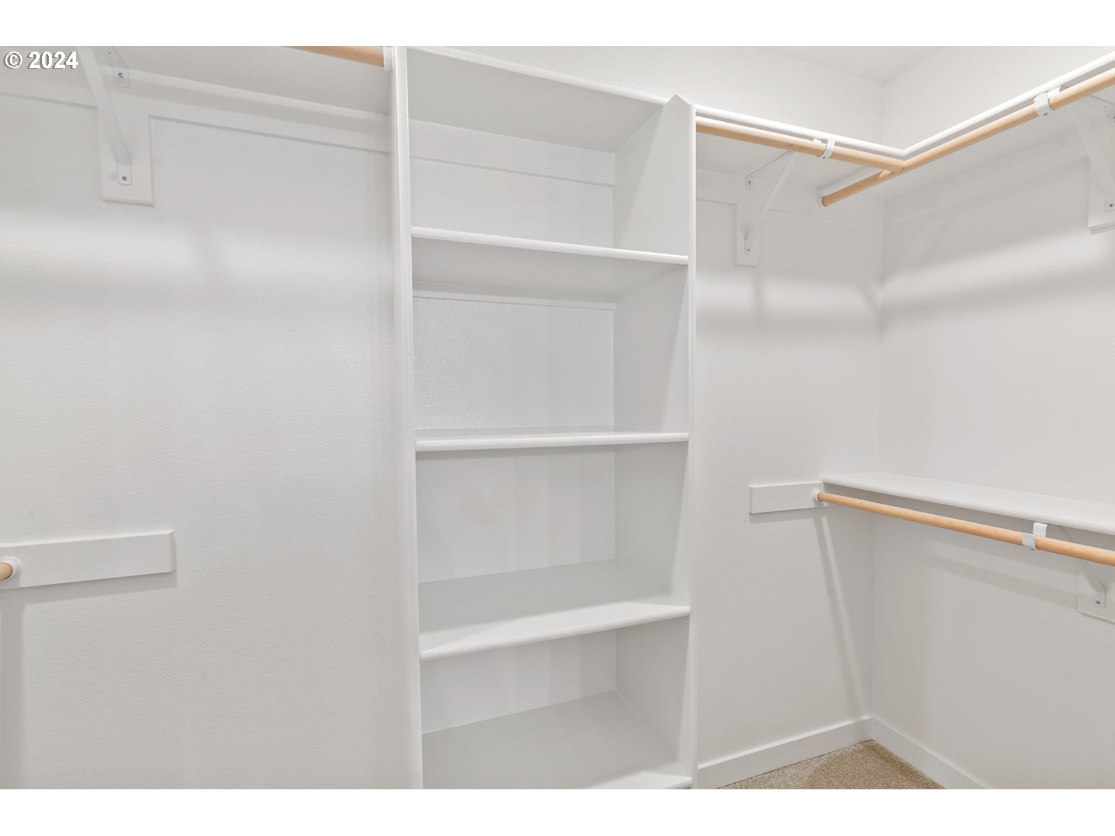 820 Northwest 178th Street Ridgefield, WA 98642 - Photo 41 of 45 a view of walk in closet with empty racks