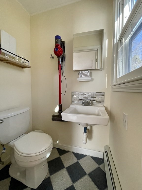 4 Vine Street Webster, MA 01570 - Photo 15 of 19 a bathroom with a sink and a mirror