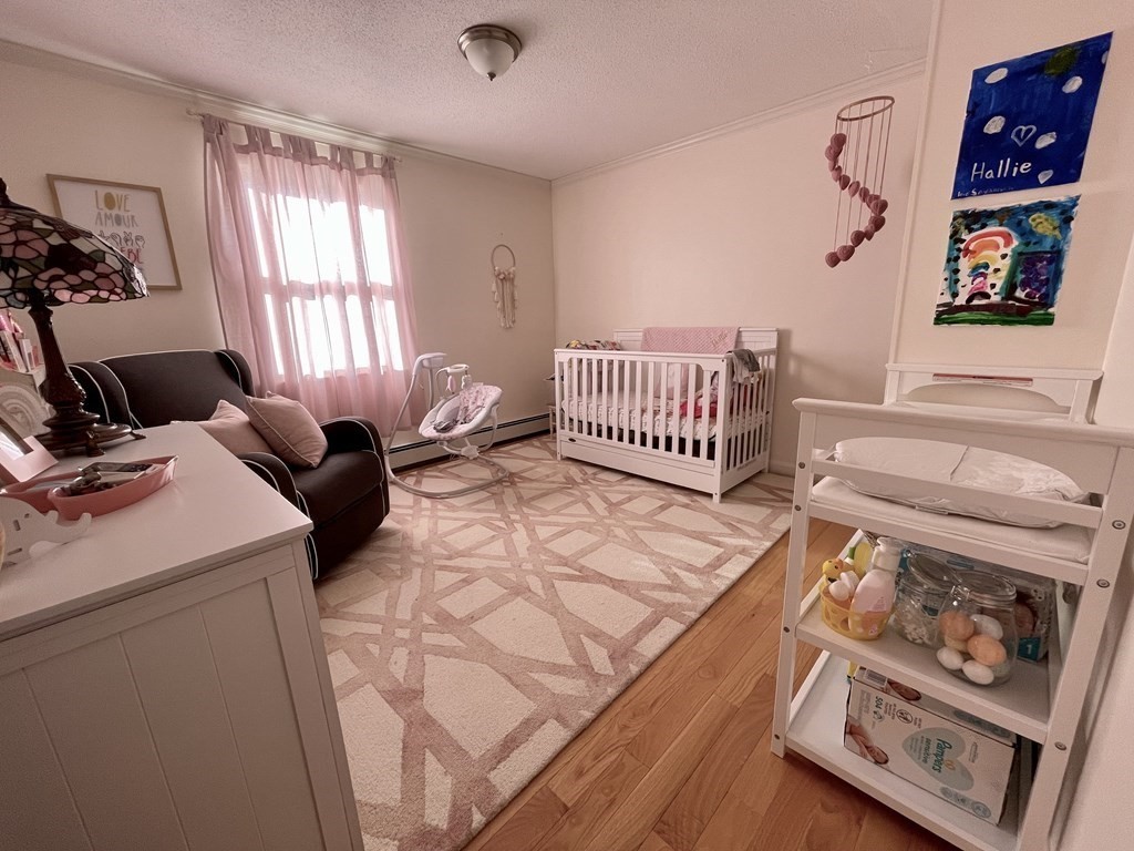 4 Vine Street Webster, MA 01570 - Photo 16 of 19 a bedroom with furniture and a window